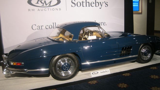 A concours winner with original matching-numbers drivetrain, this 1960 Mercedes-Benz 300 SL Roadster (with matching fitted luggage!) brought $1,375,000 at RM Sotheby's August sale in Monterey.