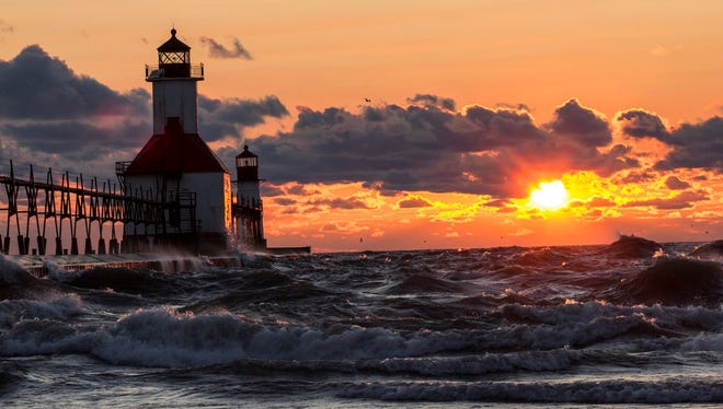 "I often jump in my Jeep on my day off and drive to the west side to photograph the shoreline and the lighthouses," said Joan Hassberger of White Lake. "The St. Joseph lighthouse is one of my favorite subjects. I arrived just in time to catch the amazing show. With the waves and the clouds it turned out to be a great photo opportunity."