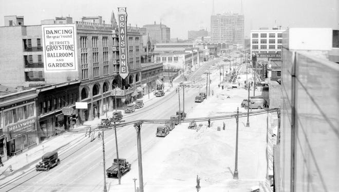 The Graystone Ballroom, one of Detroit's popular dance venues, is shown during the widening of Woodward Avenue in 1935.