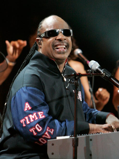 Stevie Wonder performs his song "What the Fuss?" during pregame festivities at the Detroit Pistons/San Antonio Spurs Game 3 of the NBA Finals at The Palace  on June 14, 2005.