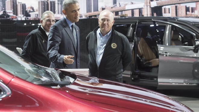 President Obama and UAW President Dennis Williams toured the North American International Auto Show in January 2016. Williams credits Obama for taking bold action to save the auto industry.