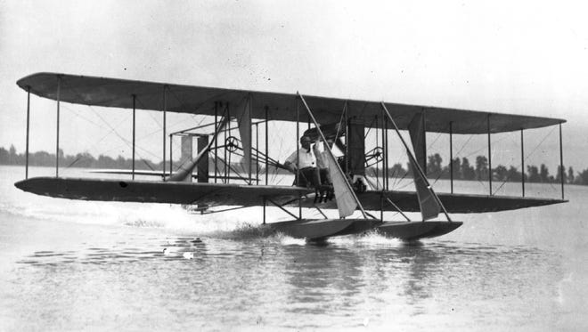 Automaker John Dodge is the passenger as The Detroit News President William E. Scripps takes off from the Detroit River in 1912. The following year, Scripps flew his airplane underneath the original Belle Isle Bridge.