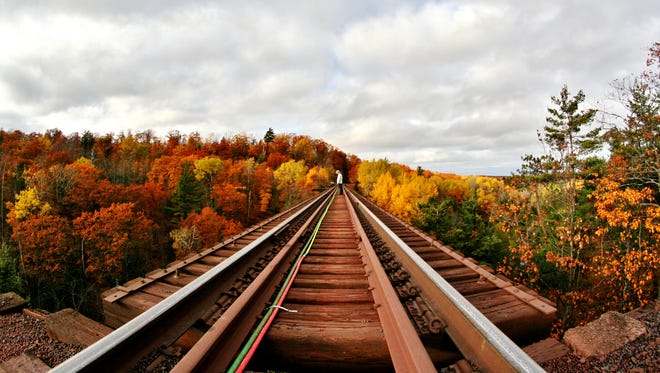 “I went on a hike with a roommate and some friends to a train bridge that we had heard has a beautiful view in Negaunee,” said Marah Seaver of Marquette.  “We got to the bridge, and I was too nervous to walk out onto it, so I captured a photo (using a fisheye lens) from the edge of the valley while my roommate explored further.”