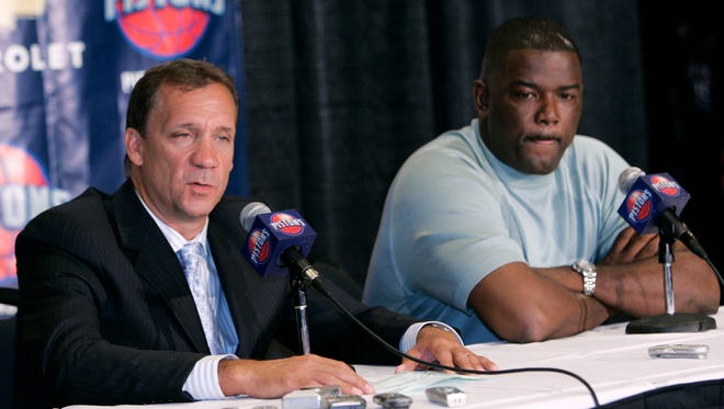 Detroit Pistons President Joe Dumars, right, announces that Flip Saunders will be the new head coach of the Detroit Pistons on July 21, 2005.