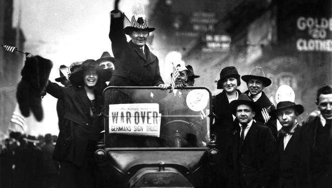 Crowds on Woodward Avenue in Detroit celebrate the end of the First World War.