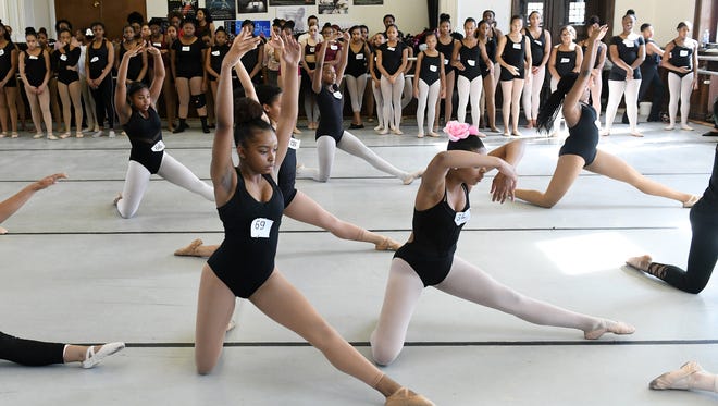 Najah Tucker, 15, of West Bloomfield left, and Mya Hayes, 12, of Detroit dance a sequence at auditions for the Carr Center's Summer Dance Intensive in partnership with the Debbie Allen Dance Academy at Marygrove College in Detroit on April 22, 2018.