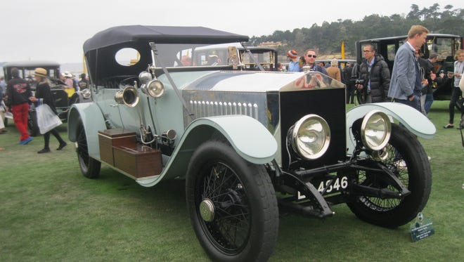 This 1914 Rolls-Royce Silver Ghost Alpine Eagle Portholme Torpedo, shown by Jonathan Feiber and Heather Buhr of Atherton, Calif., was once fitted with a truck body, with its original Porthole coachwork kept safe and re-fitted in 1947.