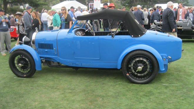 This 1928 Bugatti Type 40 has a factory-built Grand Sport body which over time underwent modifications, eventually restored in 1979 to its original configuration and later restored to original condition. It belongs to Tedd and Christina Zamjahn and Henry Adamson of Greendale, Wis.