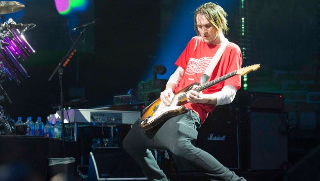 Red Hot Chili Peppers guitarist Josh Klinghoffer performs on stage at Joe Louis Arena in Detroit.