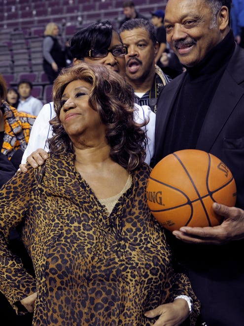 Aretha Franklin and Rev. Jesse Jackson at the Pistons vs Miami Heat game, February 11, 2011, at the Palace of Auburn Hills.