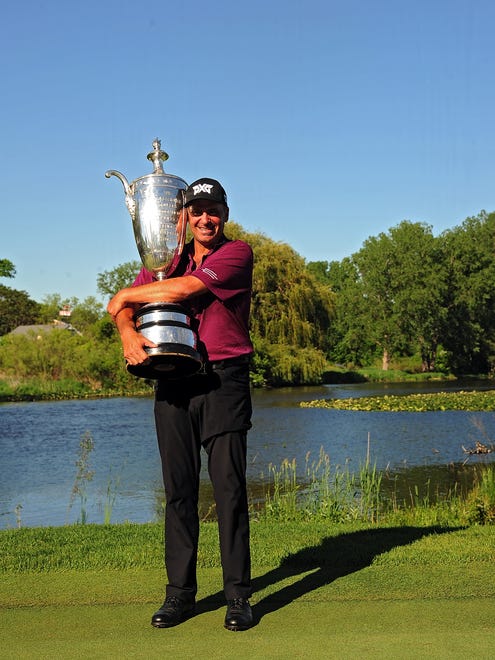Rocco Mediate celebrates winning the 2016 Senior PGA Championship at Harbor Shores in Benton Harbor.