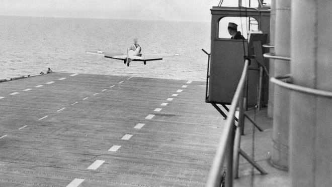 Navy training plane practices takeoffs from the deck of the USS Wolverine on May 19, 1943. The ship started as a side-wheel excursion steamer built in 1913 by the American Ship Building Co. of Wyandotte. Converted to a freshwater aircraft carrier during World War II, it was positioned in Lake Michigan.