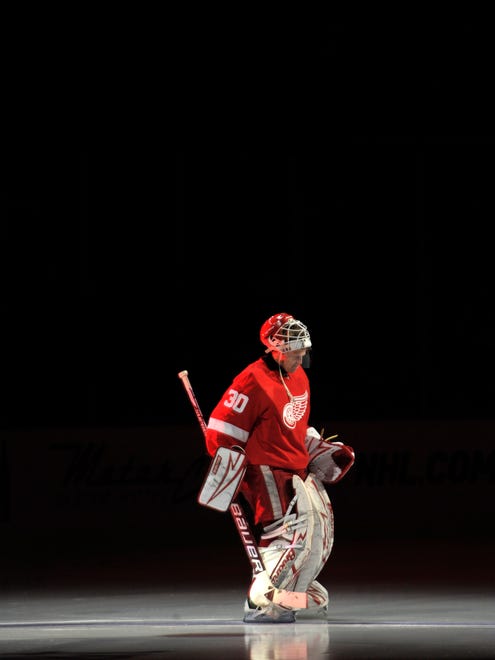 Chris Osgood is introduced before the start of the home opener against. the Chicago Blackhawks at Joe Louis Arena, October 8, 2009.