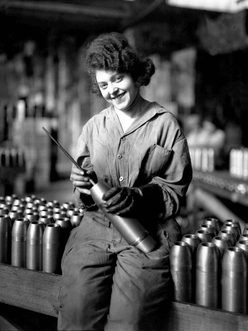 The image of "Rosie the Riveter" and women working in defense plants is usually associated with World War II. But in Detroit, legions of earlier "Rosies" worked in World War I munitions plants, like this young worker in the Maxwell Motor company.