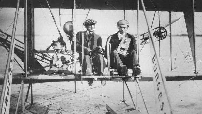 Detroit News photographer William A. Kuenzel, right, took the first aerial photos of Detroit in his employer's aiplane, piloted by Walter Brunkin.  The Burgess-Wright Model F hydro-airplane  had a wingspan of 39 feet, six inches. The engine choices in that model ranged from 35 to 50 horsepower and its maximum speed was 43 mph.