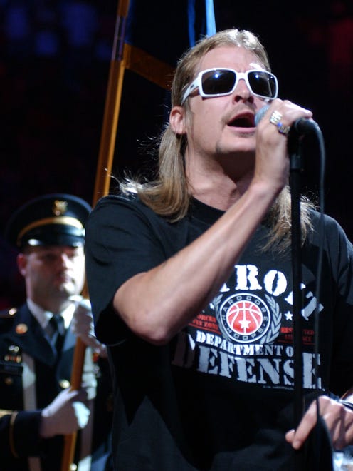 Detroit's Kid Rock sings the national anthem, dedicating it to the late President Ronald Reagan and soul great Ray Charles, during Game 4 of the NBA Finals between the Detroit Pistons and the Los Angeles Lakers on June 13, 2004.