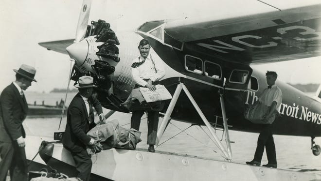 In 1929, The Detroit News launched Michigan's first aircraft dedicated to news gathering as well as newspaper distribution - a Lockheed Vega.  Detroit News employees load a plane with copies of the newspaper in July, 1930.