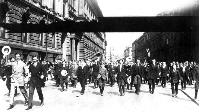 Just as the Allied countries geared up for war, so did those of the Central powers.  Here German volunteers march on a street to join the army for the Great War, August 1914.
