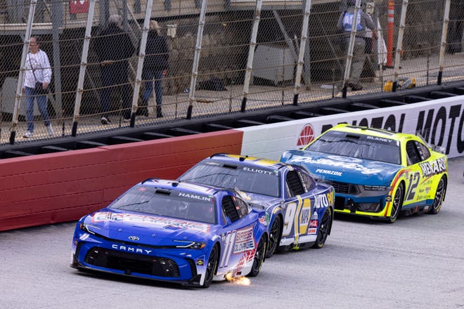 Denny Hamlin (11) leads Chase Elliott (9) and Ryan Blaney (12) during a NASCAR Cup Series auto race, Sunday, March 17, 2024, in Bristol, Tenn.