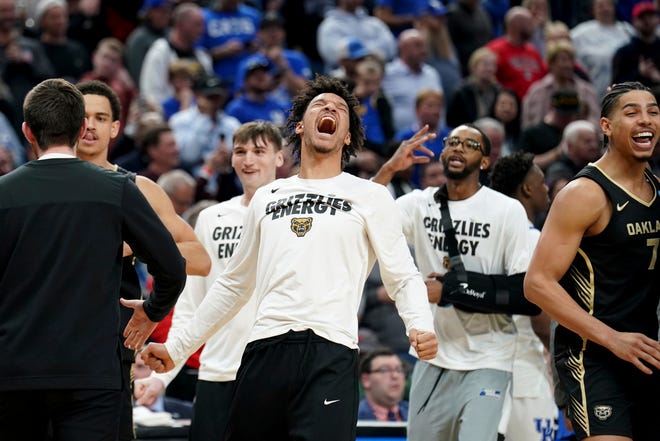 Oakland players celebrate after defeating Kentucky in a college basketball game in the first round of the men's NCAA Tournament in Pittsburgh, Thursday, March 21, 2024. Oakland won 80-76.