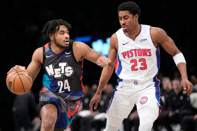 Brooklyn Nets guard Cam Thomas (24) drives against Detroit Pistons guard Jaden Ivey (23) during the first half of an NBA basketball game, Saturday, April 6, 2024, in New York. The Nets won the game, 113-103.