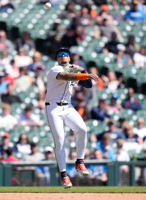 Detroit Tigers shortstop Javier Baez throws out Texas Rangers' Wyatt Langford at first during the fourth inning.