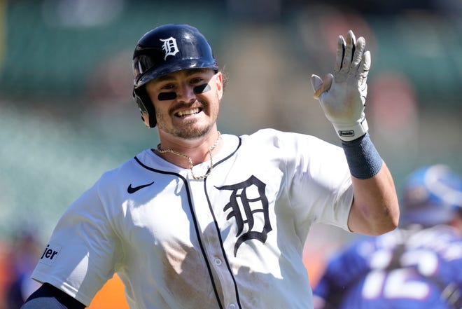 Detroit Tigers' Zach McKinstry crosses home plate to score during the sixth inning.