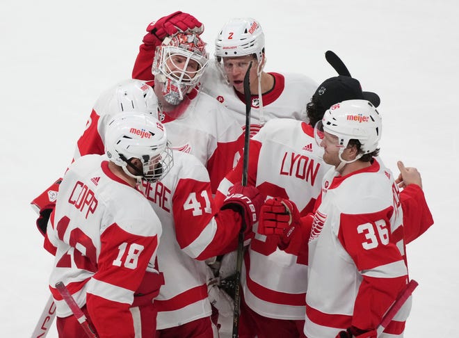 Detroit Red Wings goaltender James Reimer (47) celebrates with teammates following their shootout win, 5 to 4, against the Montreal Canadiens in an NHL hockey game in Montreal on Tuesday, April 16, 2024.