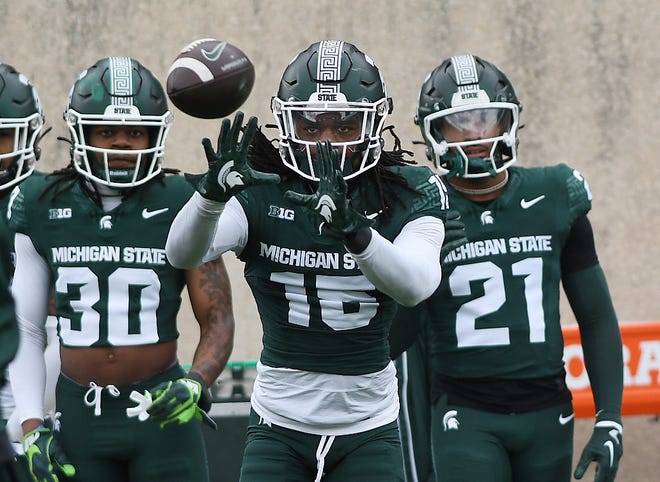 Defensive back Angelo Grose readies for a reception during drills at the Michigan State football's spring showcase/scrimmage at Spartan Stadium.