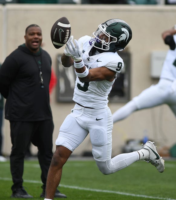 Wide receiver Jaelen Smith goes after a reception during the Michigan State football's spring showcase/scrimmage at Spartan Stadium.