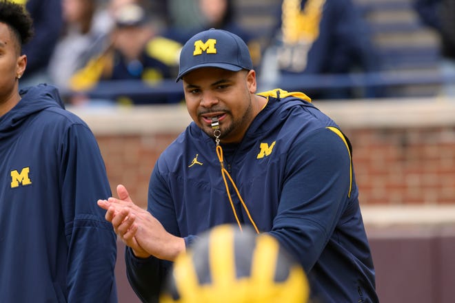Offensive line coach Grant Newsome before the start of the annual spring game at Michigan Stadium.