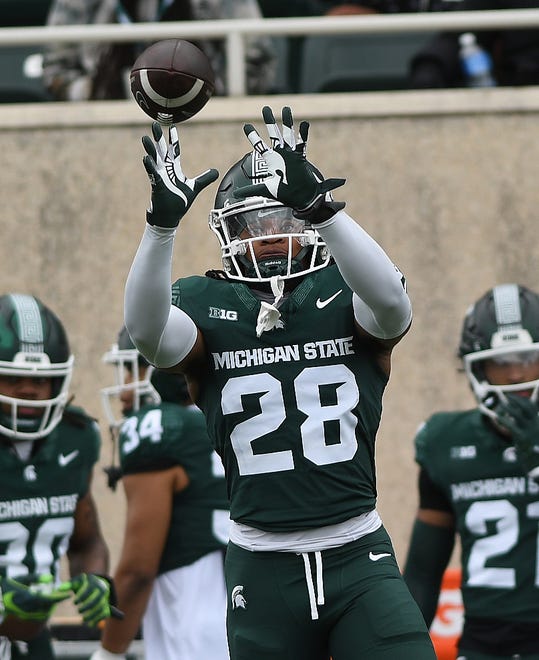 Defensive back Philip Davis readies for a reception at Michigan State football's spring showcase/scrimmage at Spartan Stadium in East Lansing, Michigan on April 20, 2024.