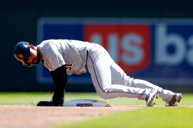 The Tigers' Riley Greene steals second base against the Twins in the first inning.