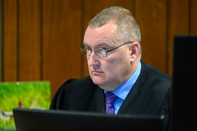 District Court Judge Christian Horkey listens during the arraignment of Marshella Chidester in his Monroe County District Court in Monroe, Tuesday, April 22, 2024. Chidester is accused of driving drunk and killing two children and injuring 13 other people at Swan Boat Club. Andy Morrison, The Detroit News