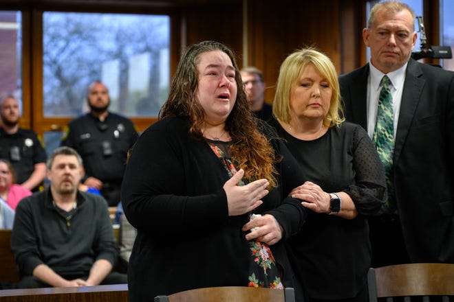 Raquel Smouthers, left, sister of Mariah Dodds, speaks to the court as defendant Marshella Chidester, far right, with defense attorney Bill Colovos, listens during an arraignment in Monroe County District Court before District Court Judge Christian Horkey in Monroe, Tuesday, April 22, 2024. Chidester is accused of driving drunk and killing two children and injuring 13 other people at Swan Boat Club. Andy Morrison, The Detroit News
