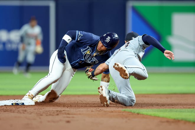 Harold Rami­rez #43 of the Tampa Bay Rays slides past Colt Keith #33 of the Detroit Tigers for a steal of second base during the second inning.