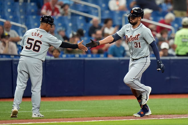 Detroit Tigers' Riley Greene (31) celebrates with third base coach Joey Cora (56) after his solo home run off Tampa Bay Rays starting pitcher Ryan Pepiot during the third inning.