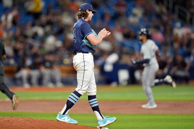 Tampa Bay Rays starting pitcher Ryan Pepiot reacts as Detroit Tigers' Riley Greene runs around the bases following his home run during the third inning.