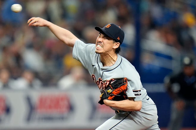 Detroit Tigers starting pitcher Kenta Maeda, of Japan, reacts as he delivers to the Tampa Bay Rays during the third inning.
