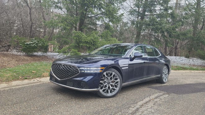The imposing, 2024 Genesis G90 is roomy, powerful, and bars signature, twin headlights.
