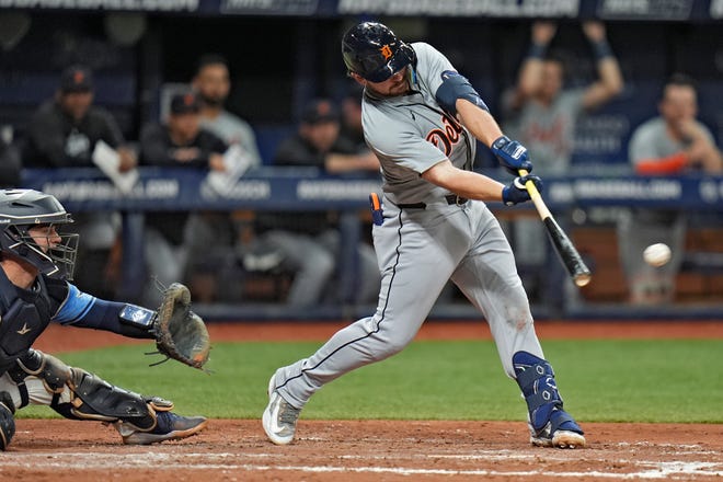 Detroit Tigers' Buddy Kennedy lines an RBI single off Tampa Bay Rays relief pitcher Chris Devenski during the sixth inning.