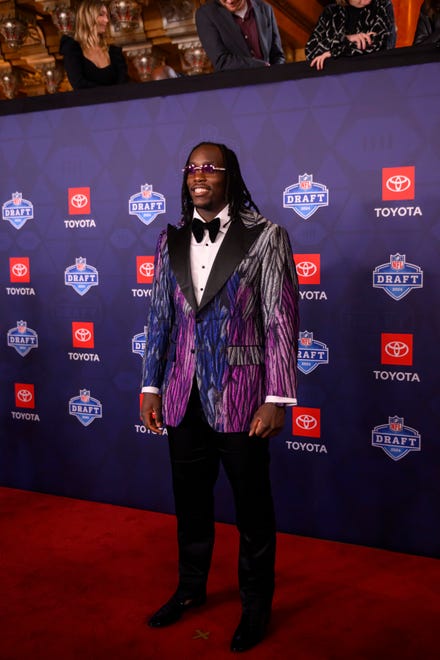 Missouri defensive lineman Darius Robinson poses for photos during the NFL Draft red carpet arrival, at the Fox Theatre, in Detroit, April 25, 2024.