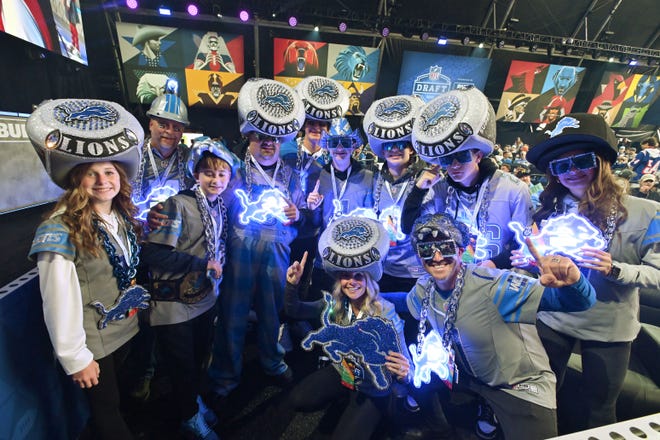 LaFontaine family and friends cheer on the Lions with custom-made Super Bowl ring hats while at the 2024 NFL Draft in Detroit.