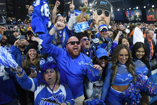 Detroit fans react to the Lions' selecting Missouri cornerback Ennis Rakestraw Jr. in the second round with the 61st overall pick during the 2024 NFL Draft in Detroit.