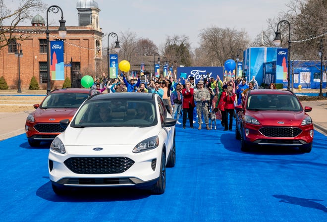Actors, performers and artists participate in the reveal of the 2020 Ford Escape during a live performance at Greenfield Village, in Dearborn, March 28, 2019.