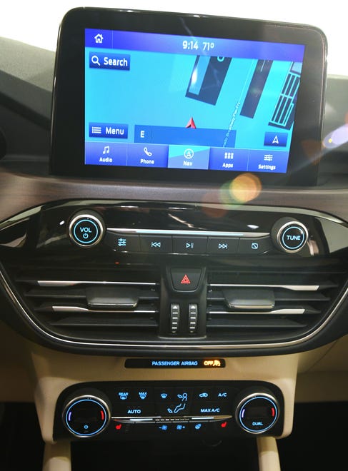 The dashboard of the 2020 Ford Escape is shown.