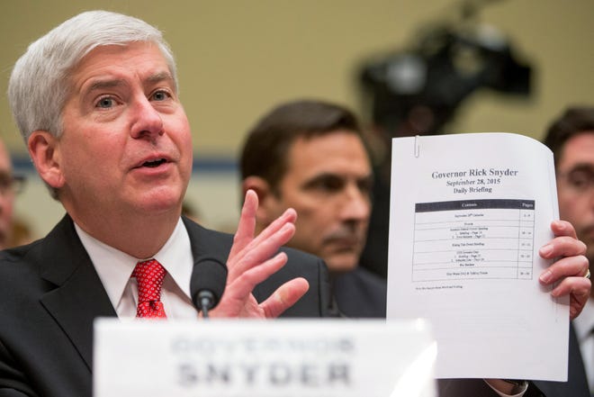 Then-Gov. Rick Snyder testifies before a House Oversight and Government Reform Committee hearing Thursday, March 17, 2016, on the circumstances surrounding lead found in tap water in Flint. The state  has turned over more records to the committee.