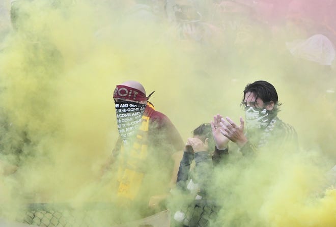 Detroit City fans start the match with the traditional smoke flares, welcoming the visiting team to Keyworth Stadium in 2019.