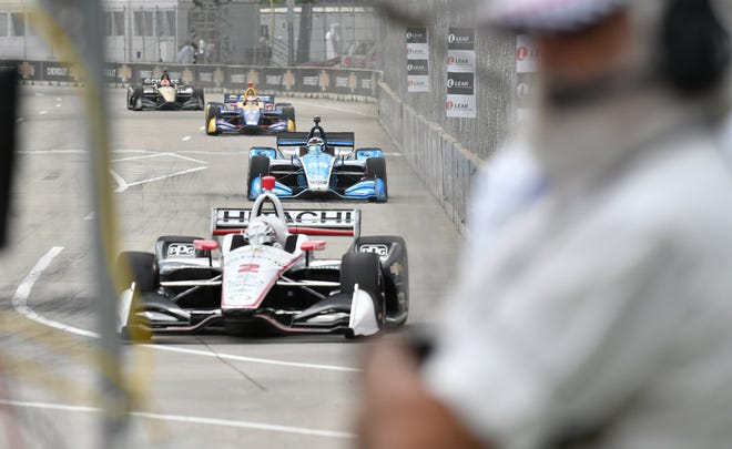 From front, Josef Newgarden followed by Max Chilton in the Dual II IndyCar Series Race at the Chevrolet Detroit Belle Isle Grand Prix on Belle Isle.