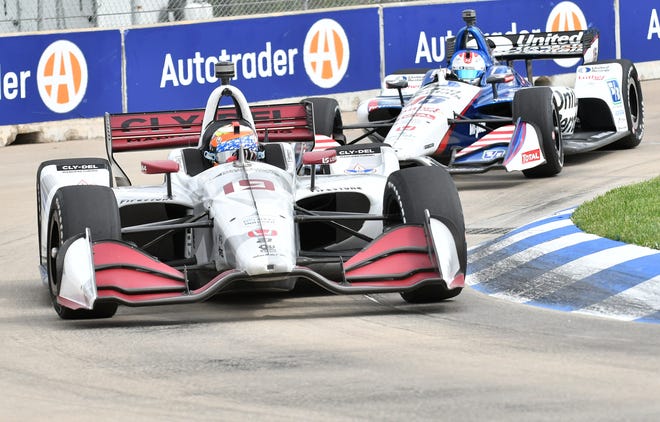 Santino Ferrucci staysin front of Graham Rahal near turn 8 at the Dual II IndyCar Series Race at the Chevrolet Detroit Belle Isle Grand Prix on Belle Isle.